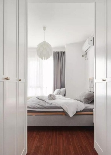 106平原木风卧室